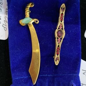 Sword Brooch and Purple Gemmed Brooch